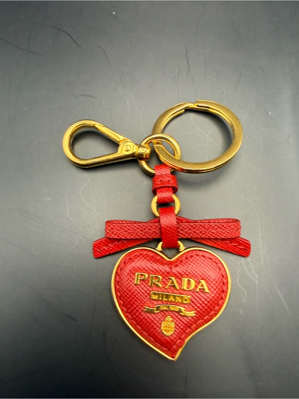 PRADA Red Heart Bow Keyring with Gold Hardware